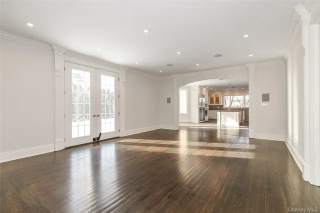 a view of a living room and wooden floor