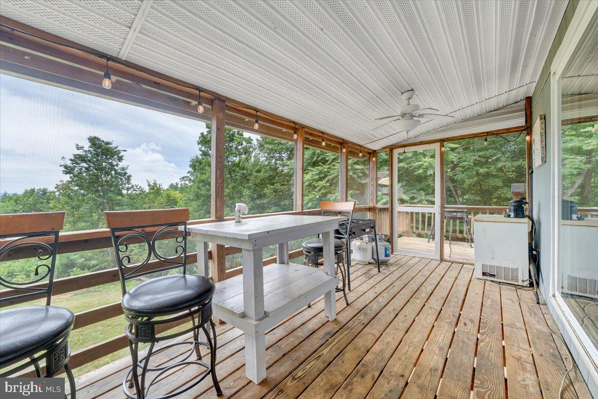 722 Foley Ridge Road Stuart, VA 24171 - Photo 31 of 67 Serene screened porch with nature views.