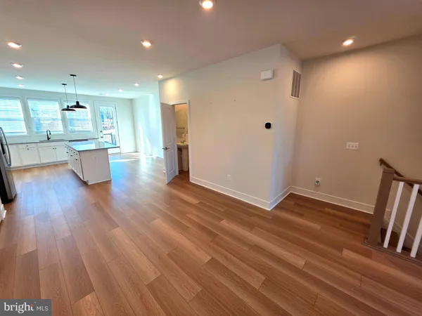 a view of a living room and dining room