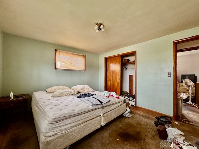 4733 Curtis Drive Springfield, OH 45503 - Photo 26 of 50 This spacious bedroom offers ample natural light and direct access to an adjacent room.