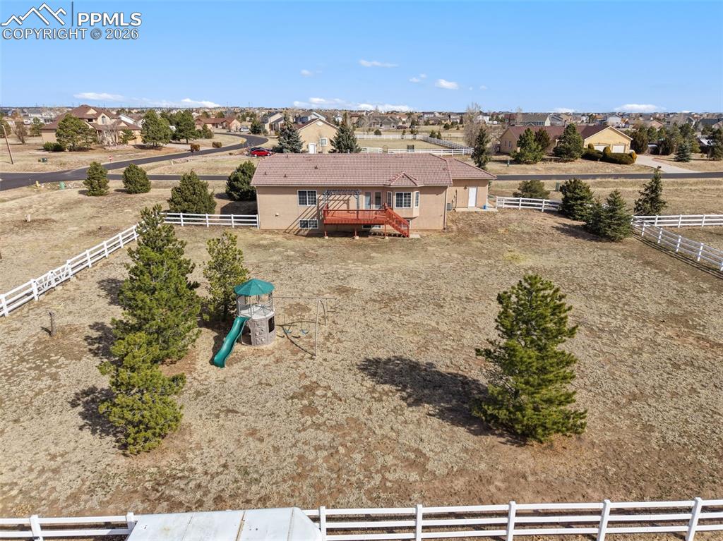 11515 Texarkanna Road Peyton, CO 80831 - Photo 5 of 43 Aerial perspective of suburban area