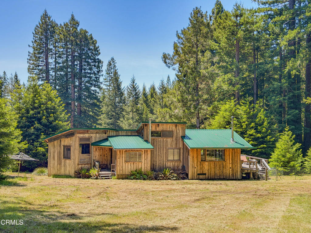 28680 Comptche Ukiah Road Comptche, CA 95427 - Photo 5 of 58 a front view of a house with a yard