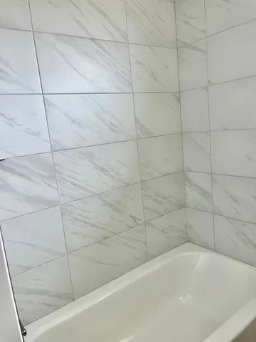 a bathroom with a bathtub