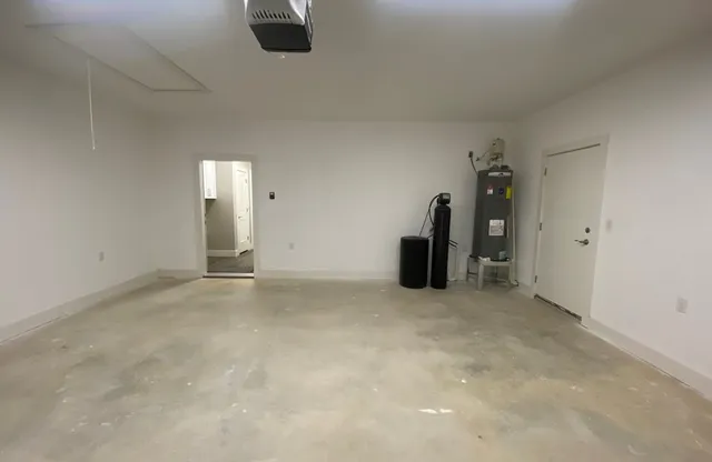 a view of an empty room with closet