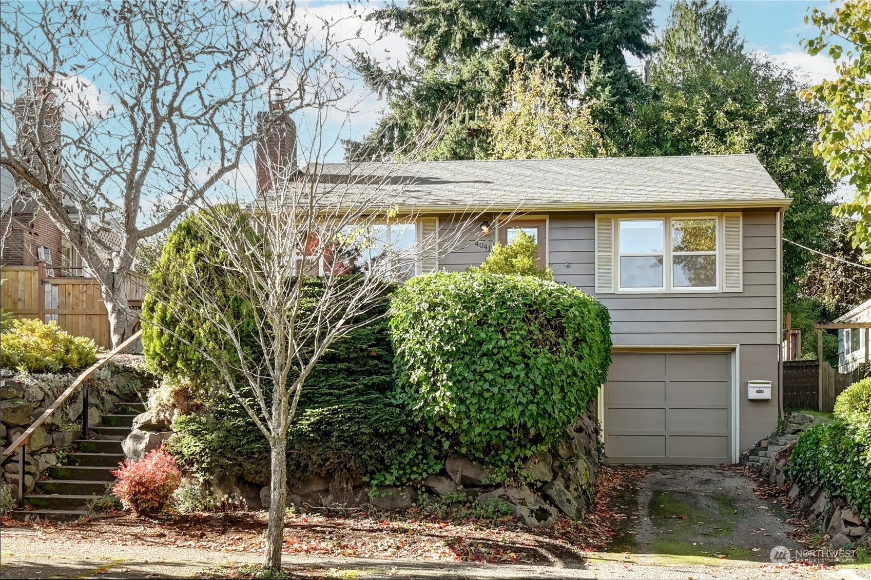 4041 48th Avenue Southwest Seattle, WA 98116 - Photo 28 of 28 a front view of a house with garden