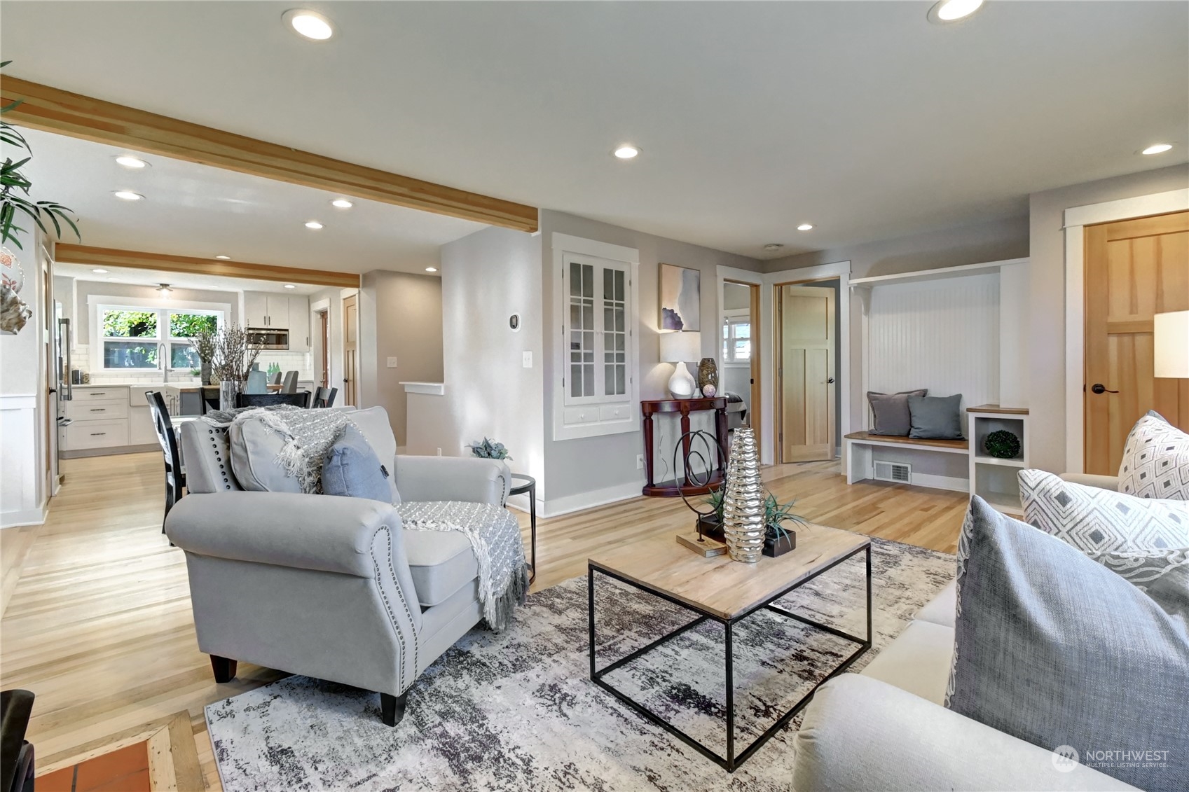 4041 48th Avenue Southwest Seattle, WA 98116 - Photo 4 of 28 a living room with furniture and view of kitchen