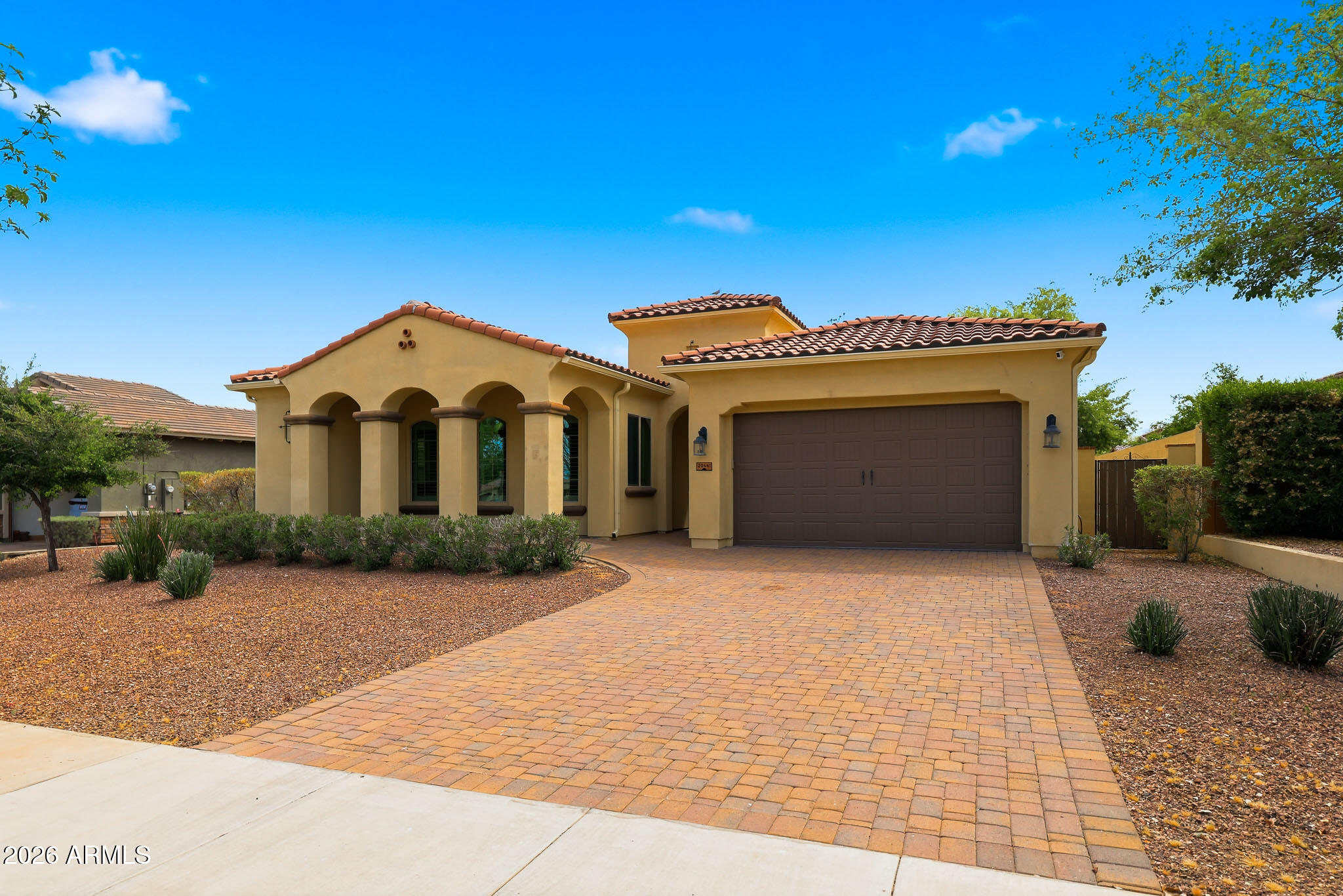 20441 West Hamilton Street Buckeye, AZ 85396 - Photo 1 of 88 a front view of a house with a yard