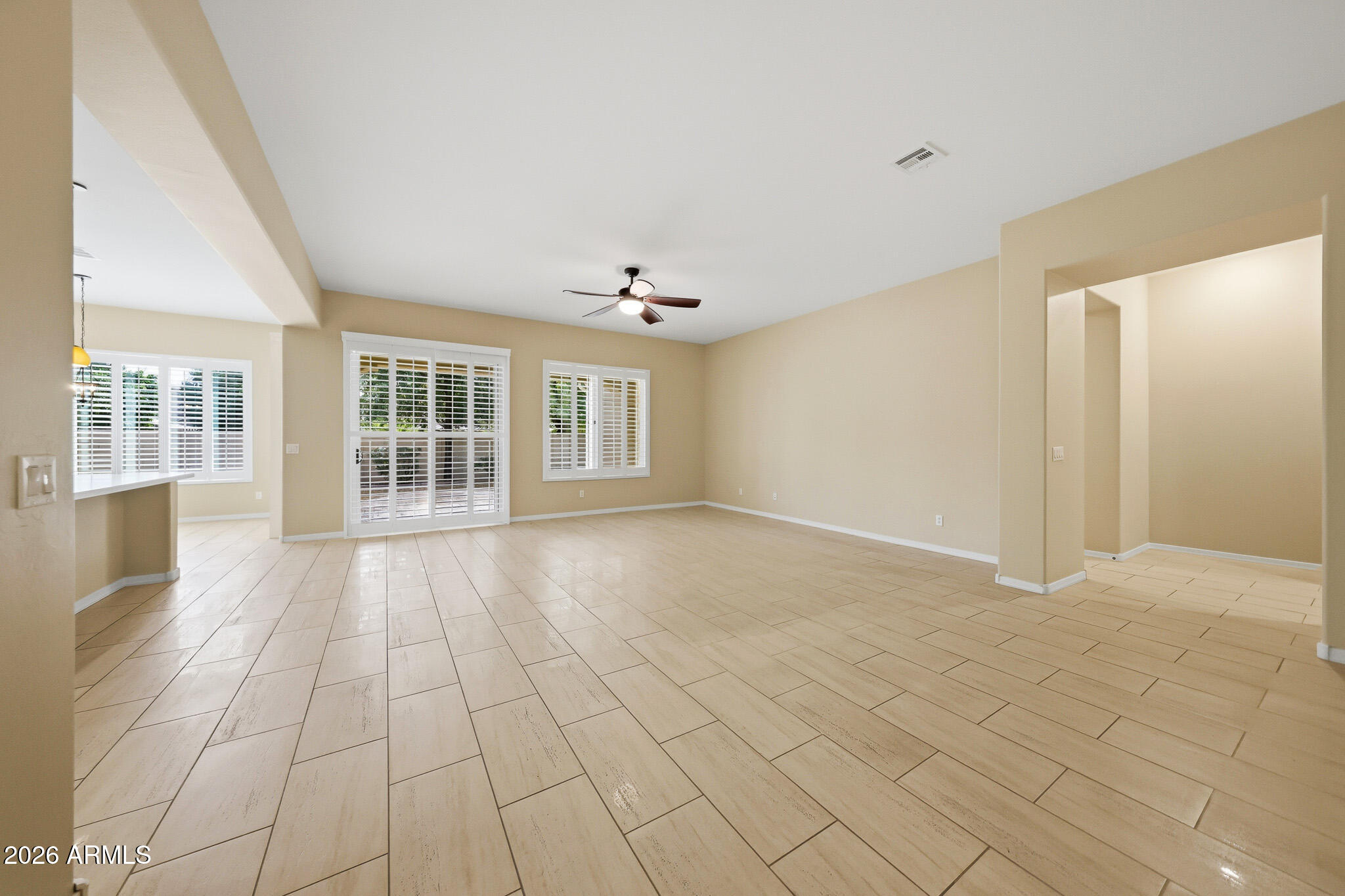 20441 West Hamilton Street Buckeye, AZ 85396 - Photo 12 of 88 a view of an empty room with a window