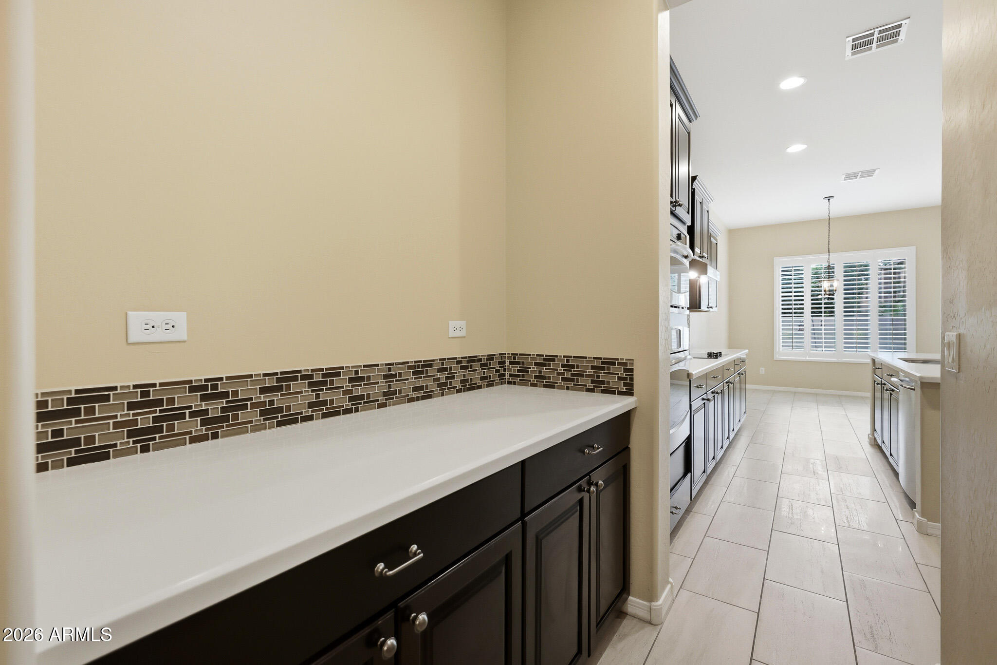 20441 West Hamilton Street Buckeye, AZ 85396 - Photo 20 of 88 a view of a bathroom with a sink and a shower