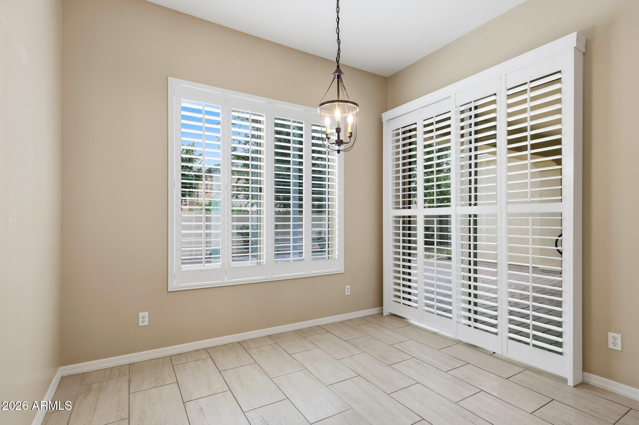 20441 West Hamilton Street Buckeye, AZ 85396 - Photo 22 of 88 a view of an empty room with a window