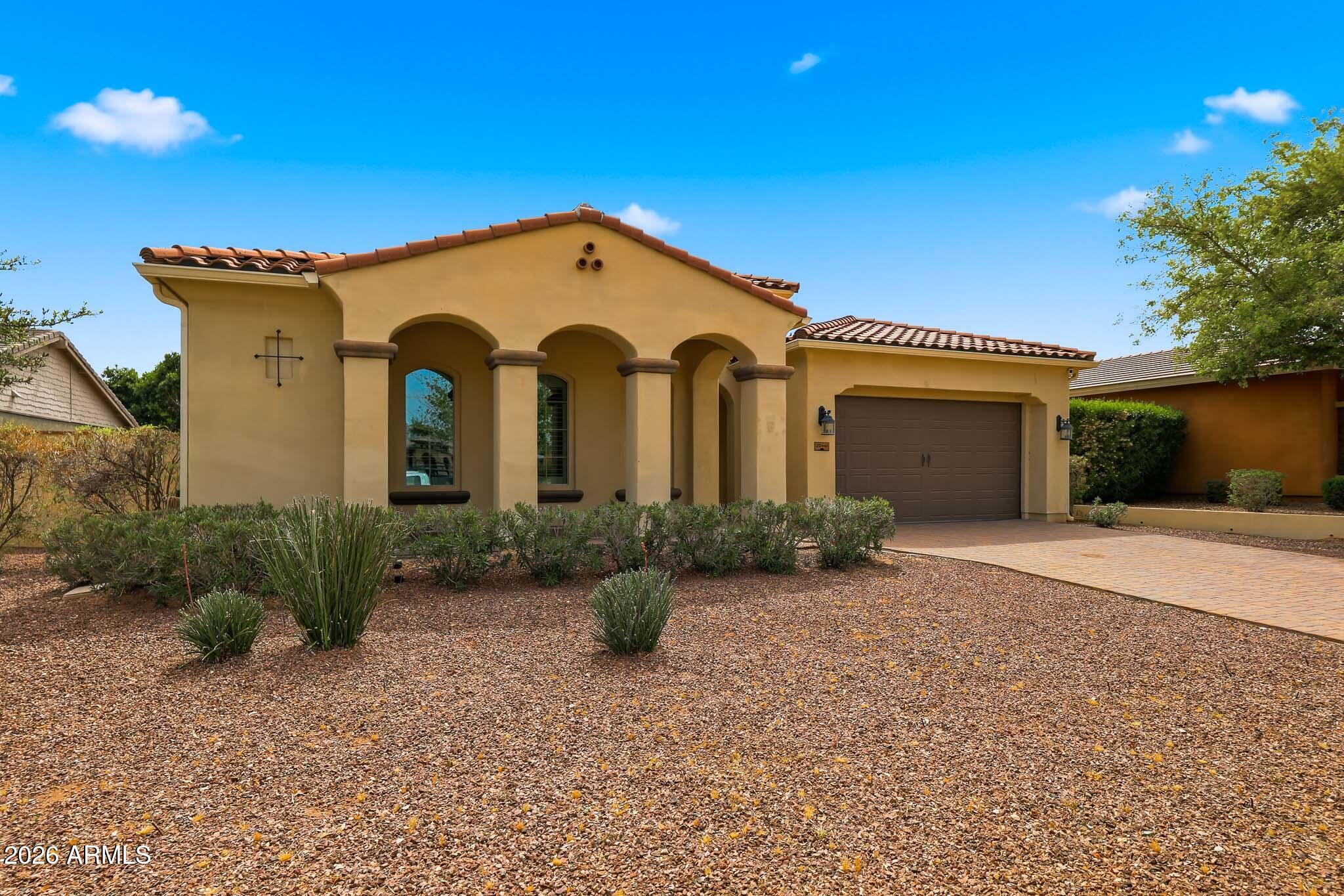 20441 West Hamilton Street Buckeye, AZ 85396 - Photo 3 of 88 a front view of a house with garden