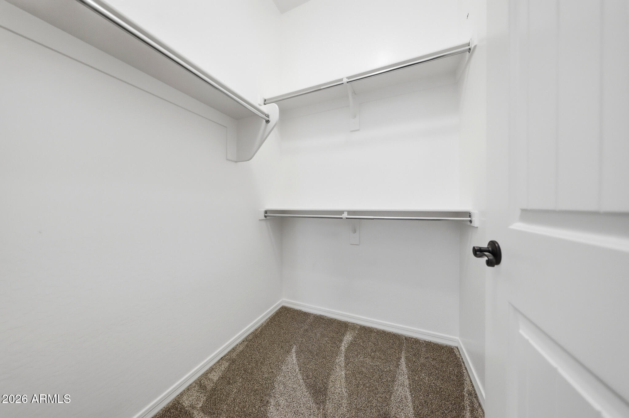 20441 West Hamilton Street Buckeye, AZ 85396 - Photo 35 of 88 a view of a room with shelf