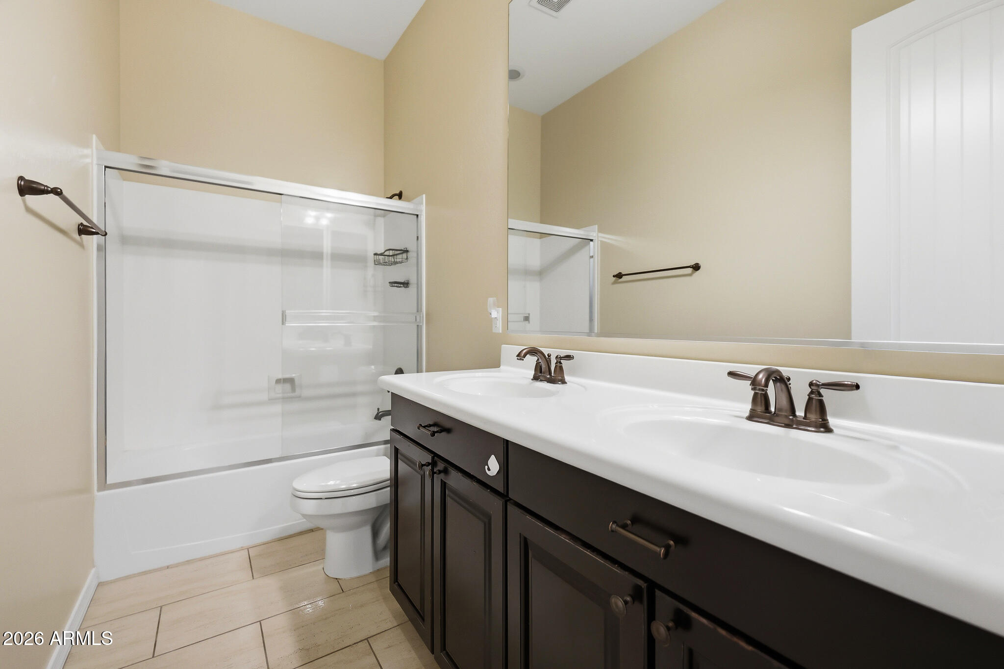 20441 West Hamilton Street Buckeye, AZ 85396 - Photo 36 of 88 a bathroom with a sink a toilet and shower