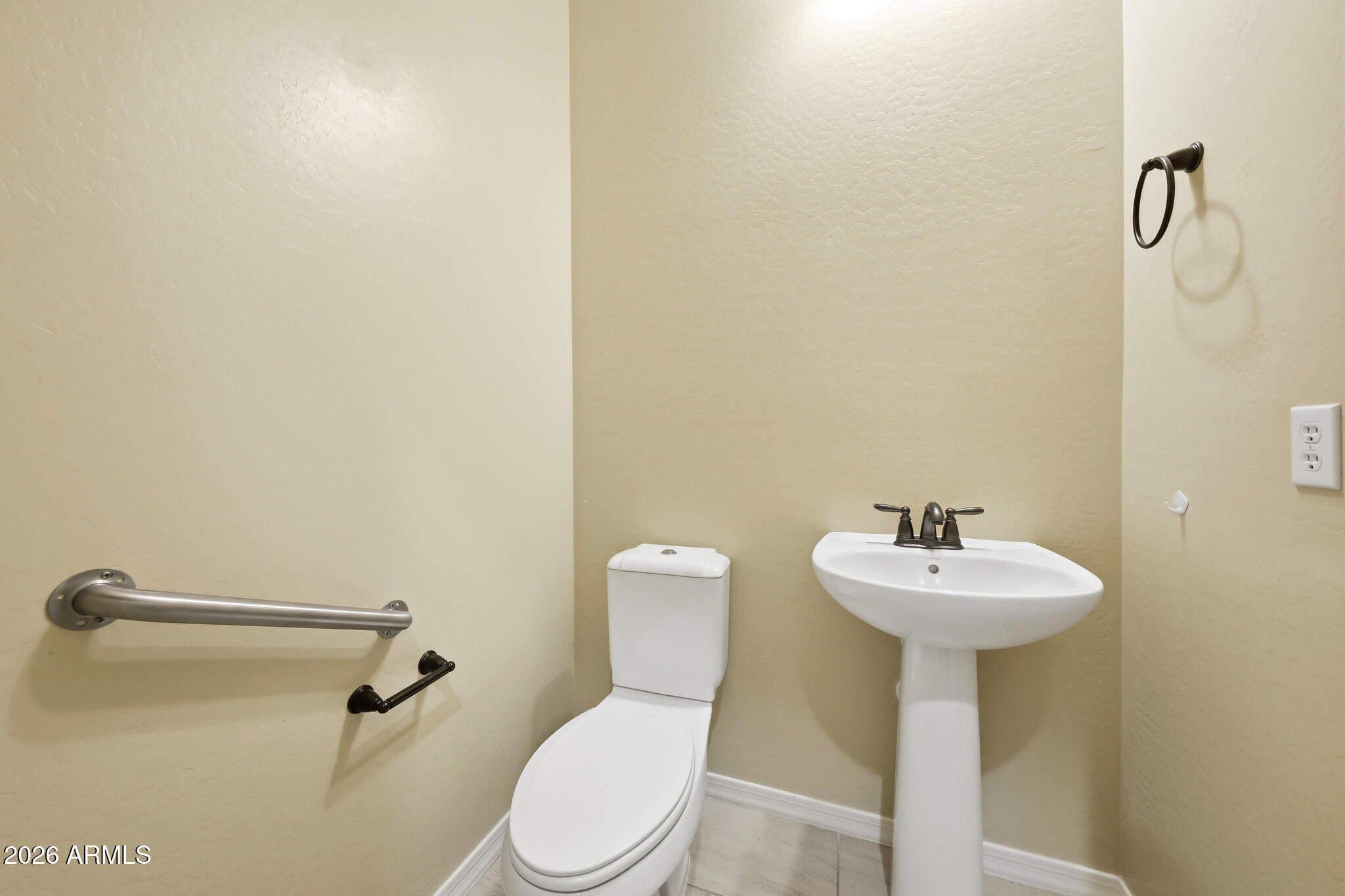 20441 West Hamilton Street Buckeye, AZ 85396 - Photo 40 of 88 a bathroom with a sink a mirror and toilet