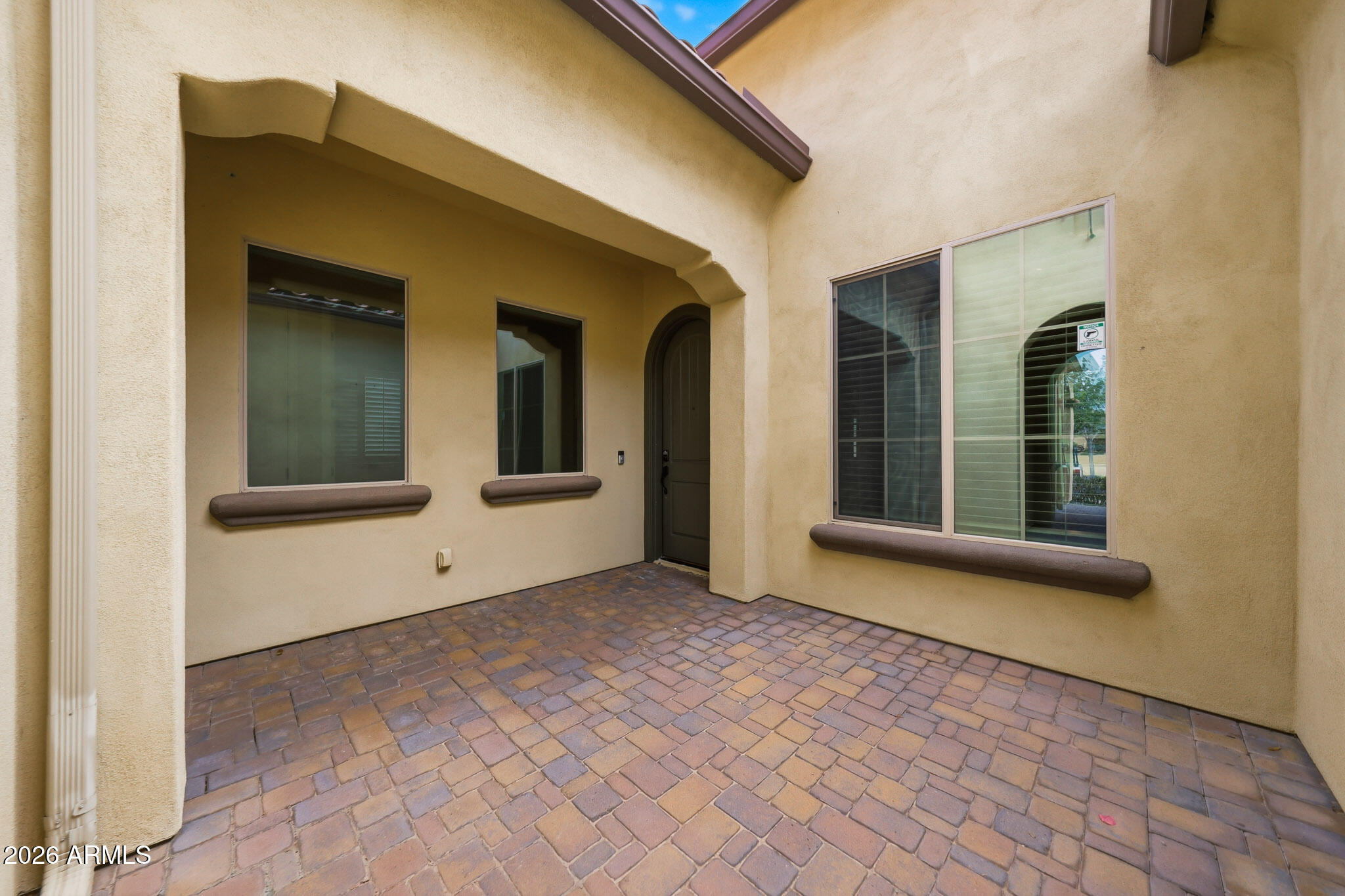20441 West Hamilton Street Buckeye, AZ 85396 - Photo 4 of 88 a view of an empty room with window