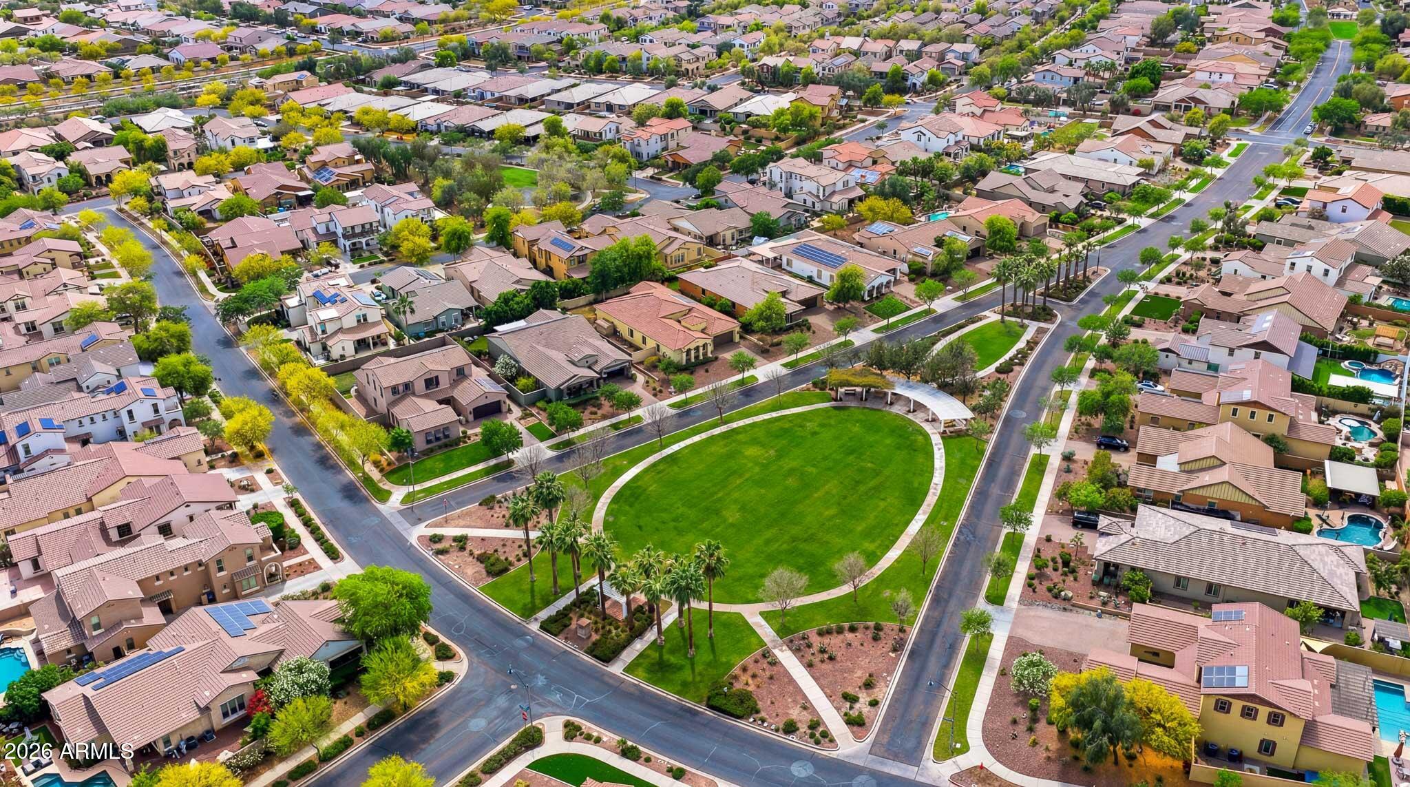 20441 West Hamilton Street Buckeye, AZ 85396 - Photo 50 of 88 an aerial view of a tennis ground and tennis court