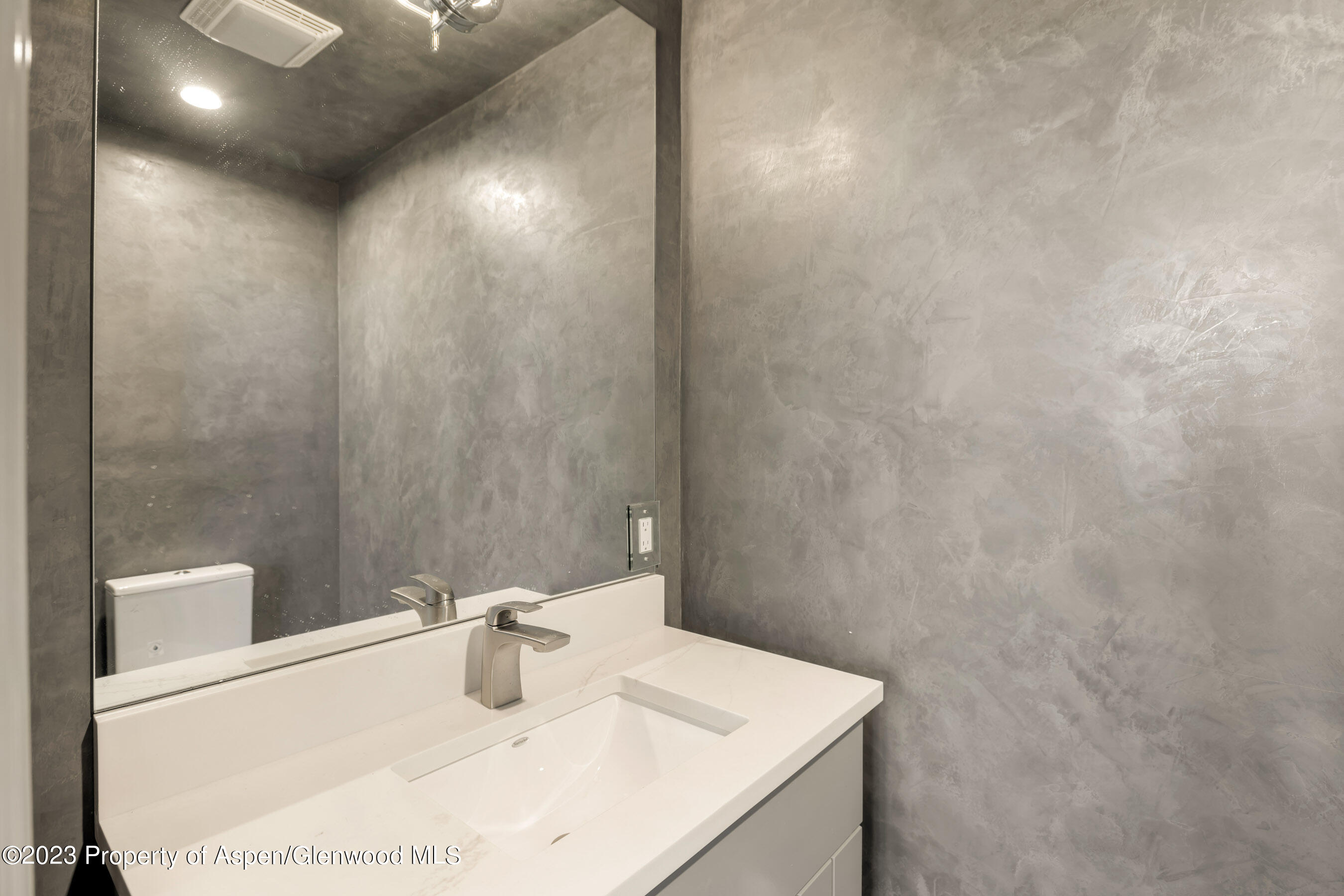 1036 Red Mountain Road Aspen, CO 81611 - Photo 12 of 37 a bathroom with a sink and a mirror