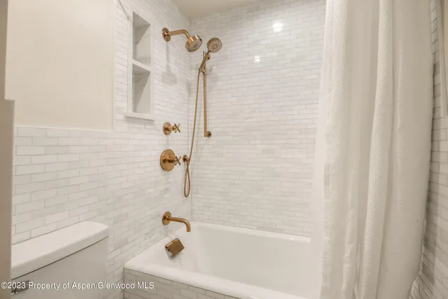 a bathroom with a bathtub