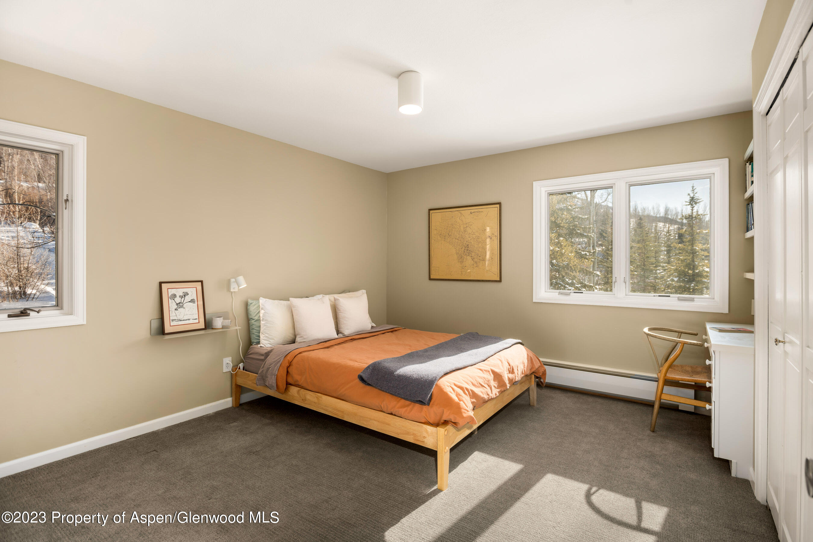 1036 Red Mountain Road Aspen, CO 81611 - Photo 17 of 37 a bedroom with a bed and a window