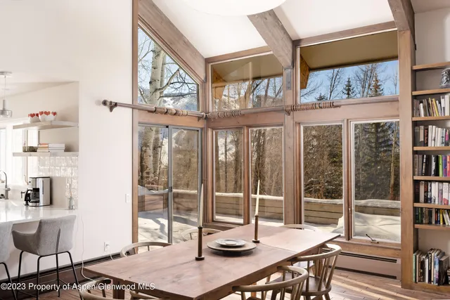 a view of a workspace with furniture