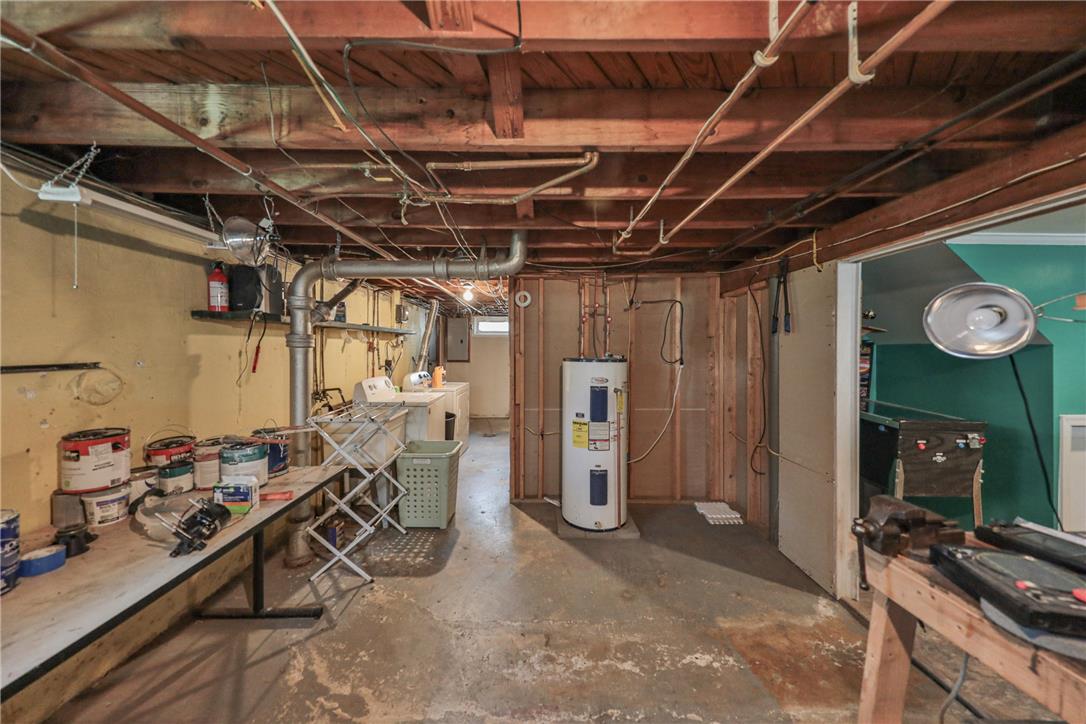 3050 Cornwall Road Bethlehem, PA 18017 - Photo 54 of 80 A well-lit unfinished basement provides ample utility space for household needs.
