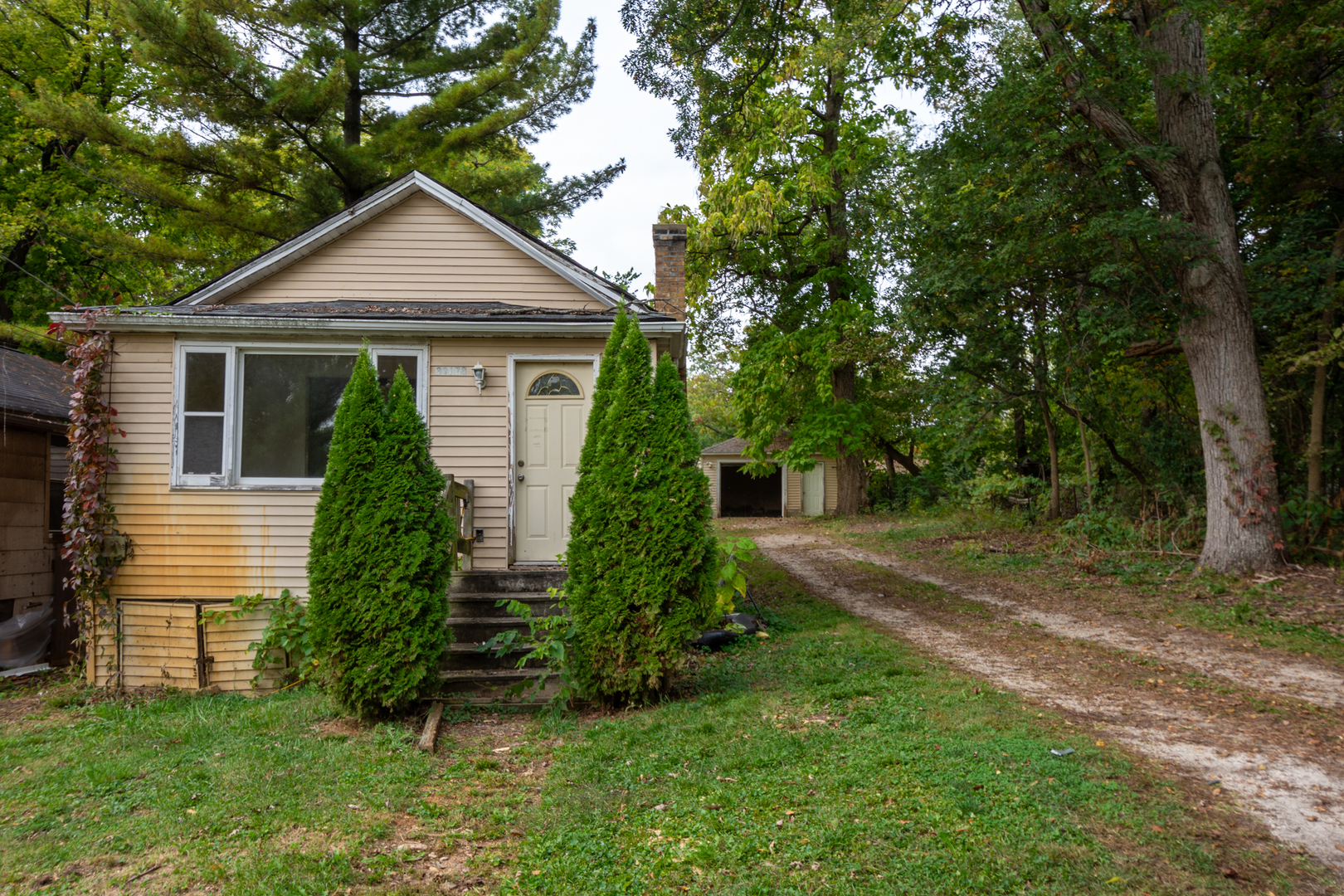 38178 1st Avenue Spring Grove, IL 60081 - Photo 1 of 19 a front view of a house with a yard