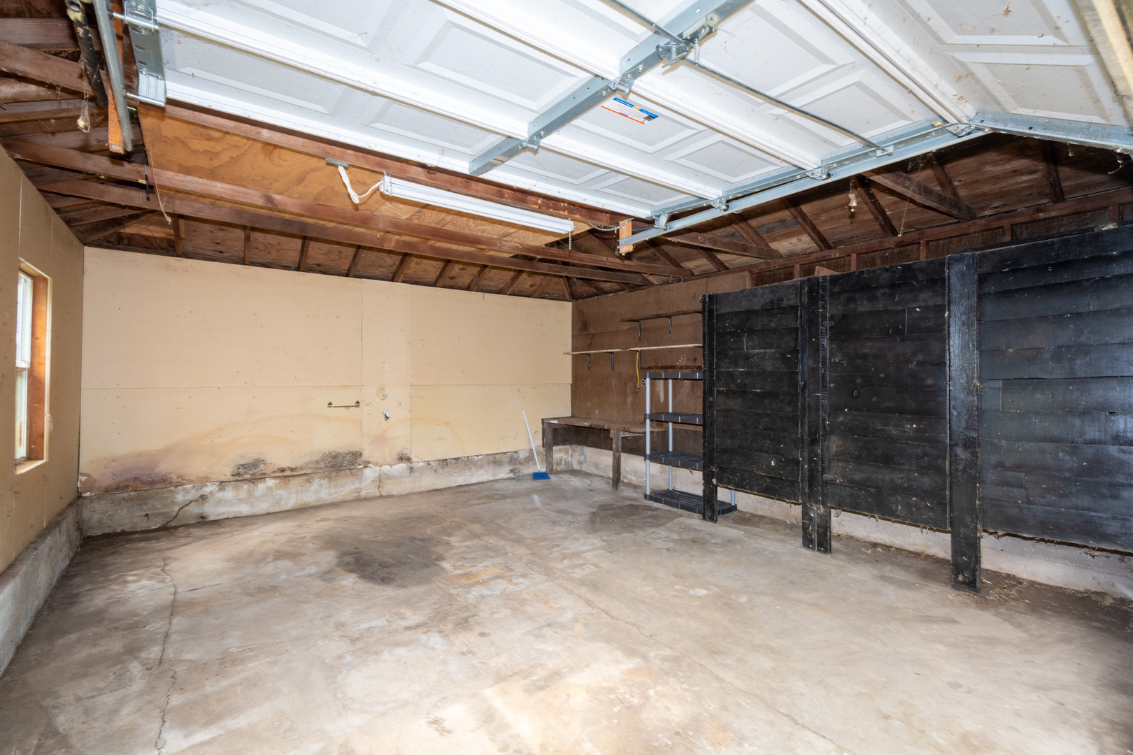 38178 1st Avenue Spring Grove, IL 60081 - Photo 17 of 19 a view of a room with wooden walls