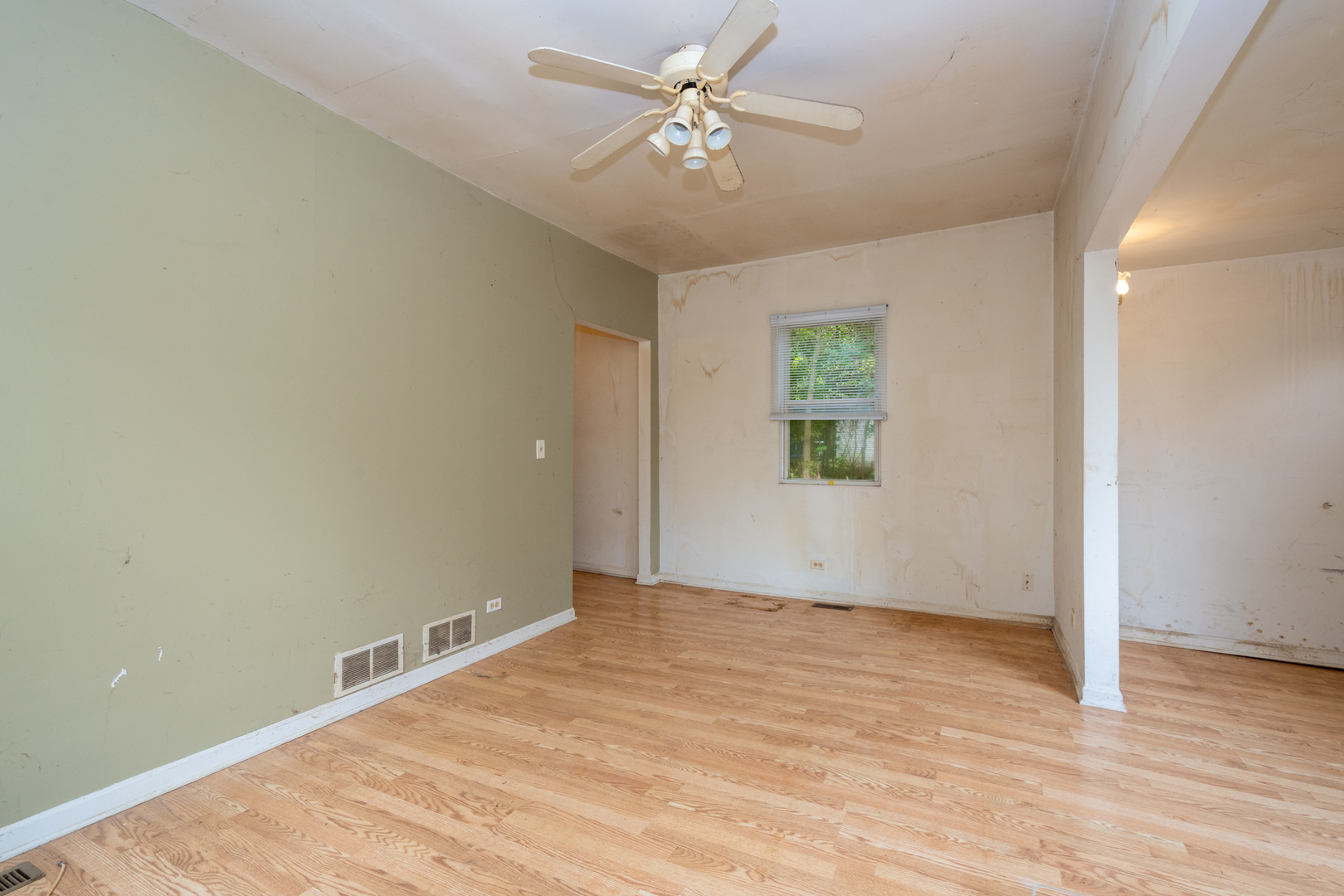 38178 1st Avenue Spring Grove, IL 60081 - Photo 5 of 19 wooden floor in an empty room with a window
