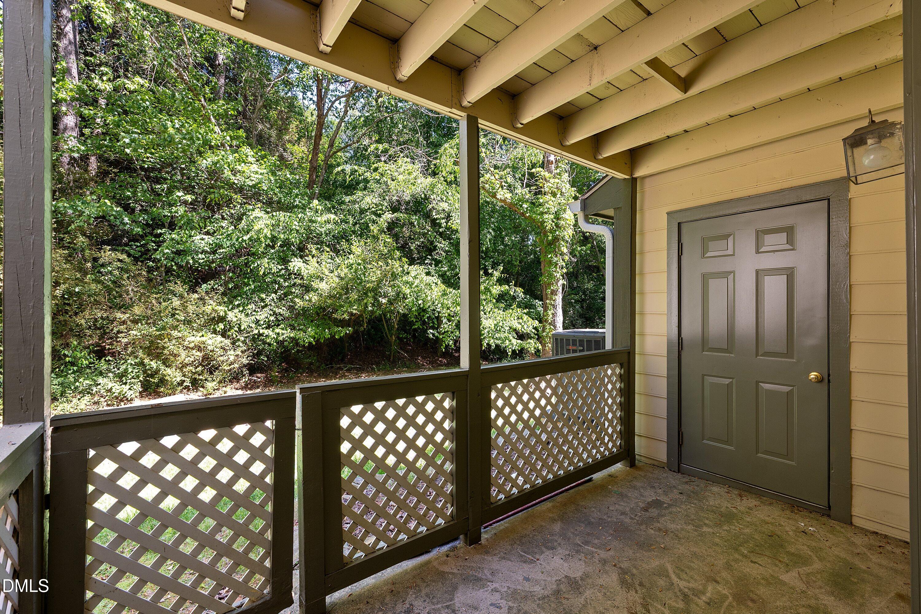 305 Broad Leaf Circle Raleigh, NC 27613 - Photo 11 of 15 Back patio with storage
