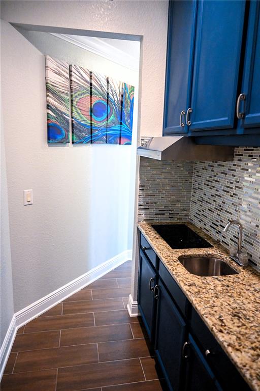 604 Morrill Court Valrico, FL 33594 - Photo 16 of 18 a kitchen with a sink and cabinets