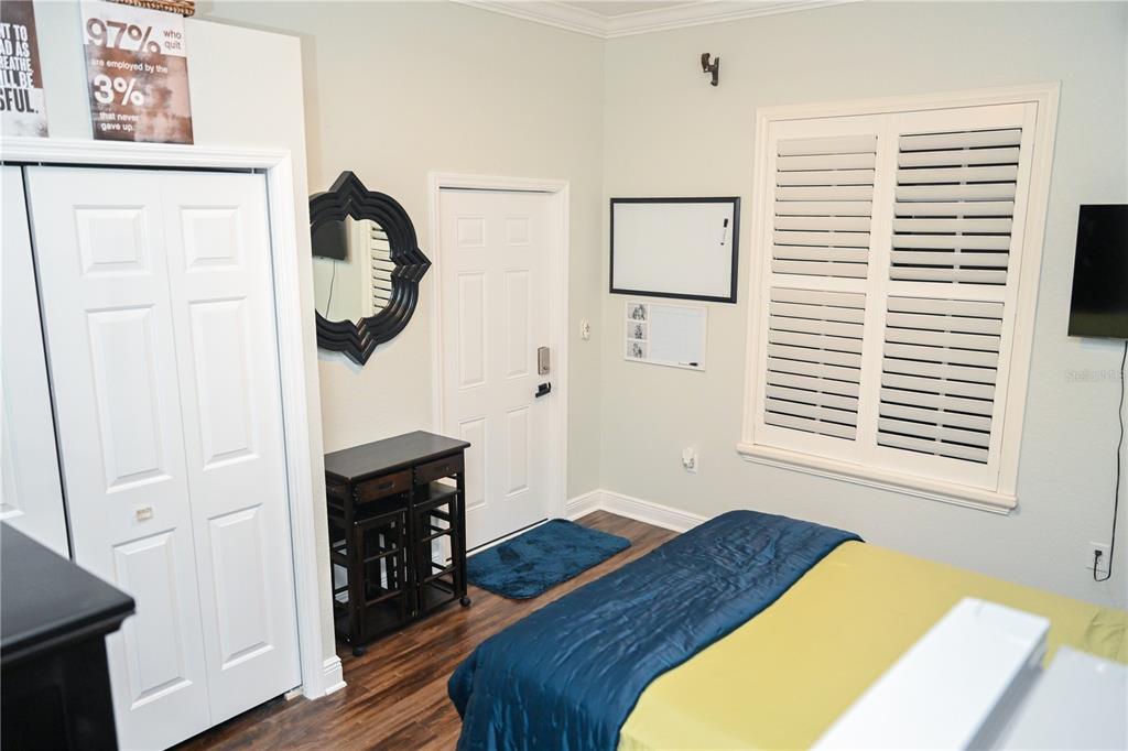 604 Morrill Court Valrico, FL 33594 - Photo 2 of 18 a bedroom with a bed and a window