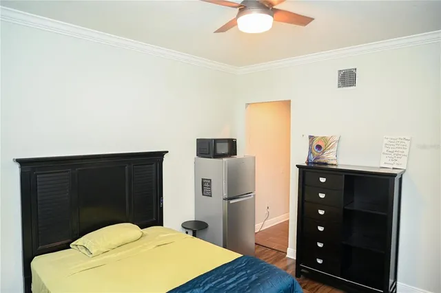 a bedroom with a bed and a closet