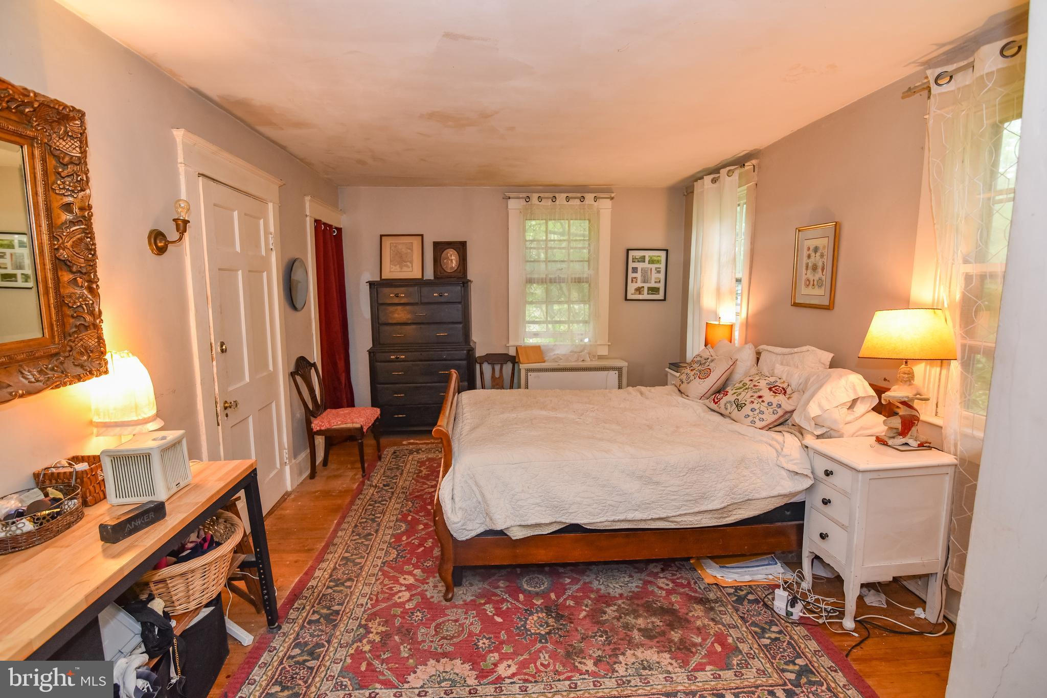 24 Merrymount Road Baltimore, MD 21210 - Photo 27 of 48 a bedroom with a bed and wooden floor