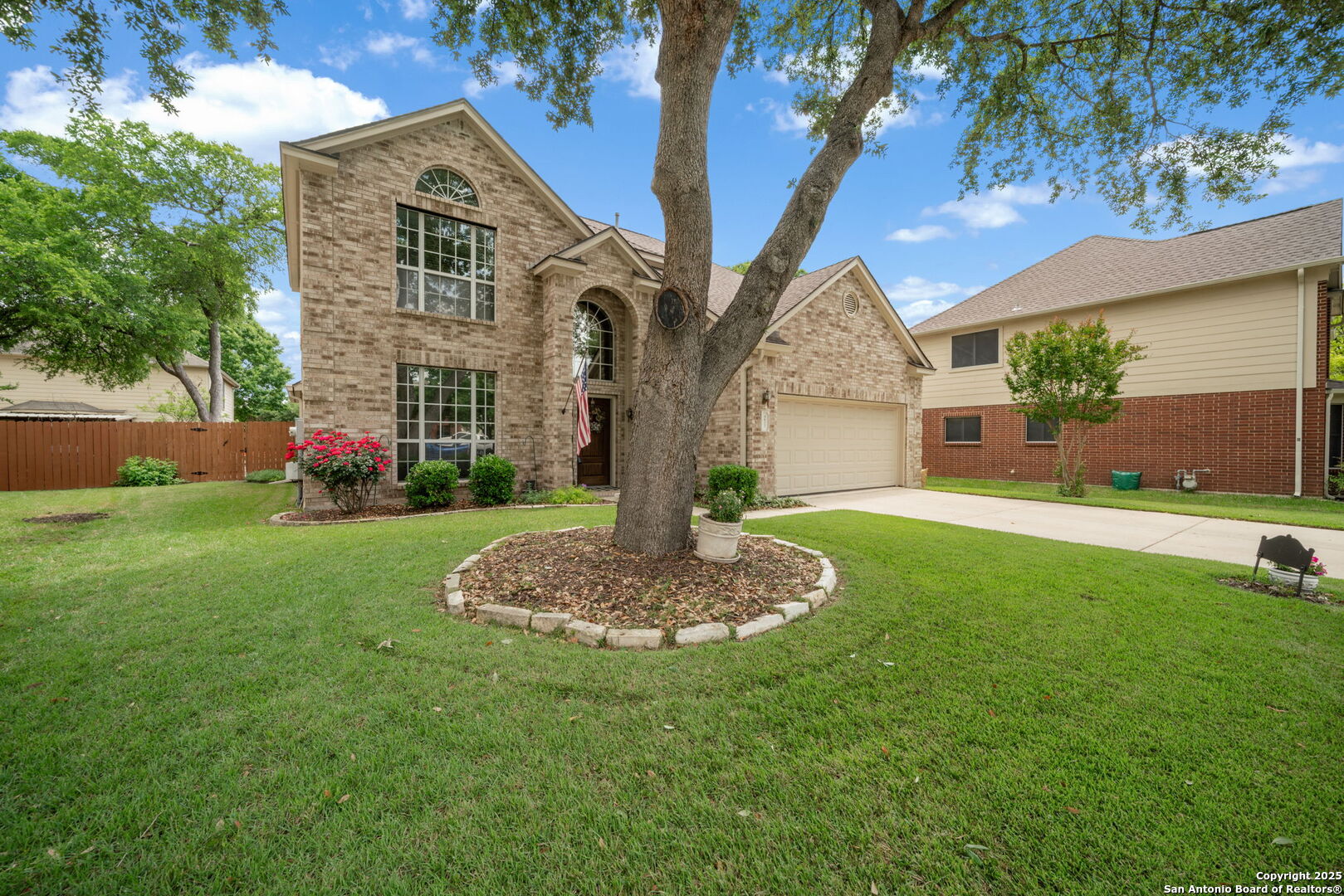 4637 Red Rock Pass Schertz, TX 78154 - Photo 1 of 1 a front view of house with yard and green space
