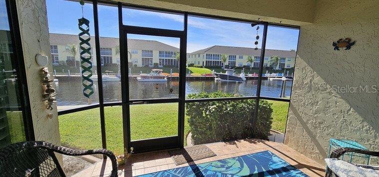 3920 Bal Harbor Boulevard, Unit E4 Punta Gorda, FL 33950 - Photo 12 of 24 a balcony view with a potted plant