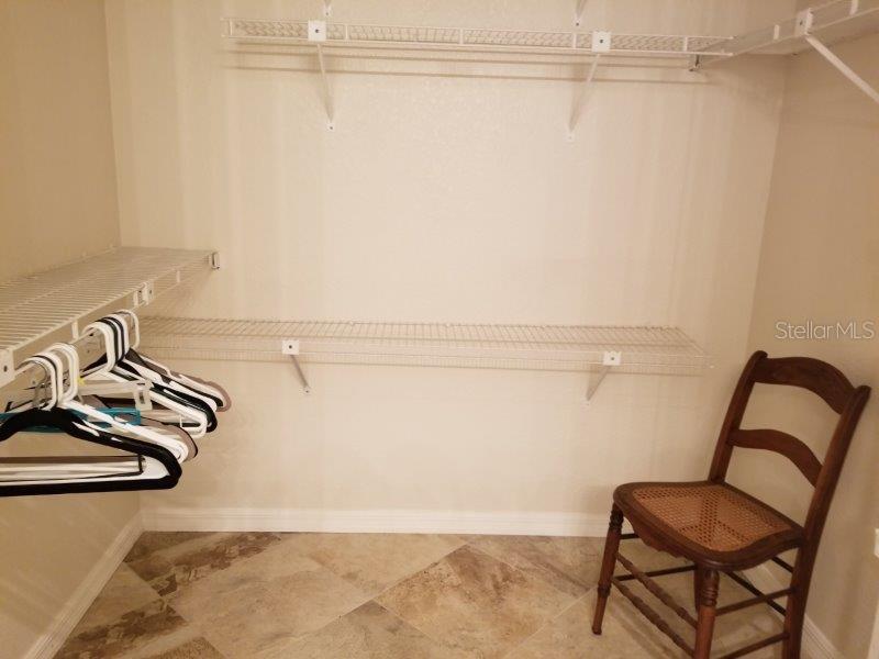 3920 Bal Harbor Boulevard, Unit E4 Punta Gorda, FL 33950 - Photo 22 of 24 a view of a room with rack on the wall