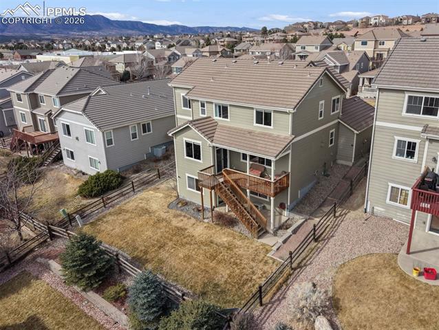 837 Altamont Ridge Drive Colorado Springs, CO 80921 - Photo 29 of 32 Back of fenced back yard, walk out basement