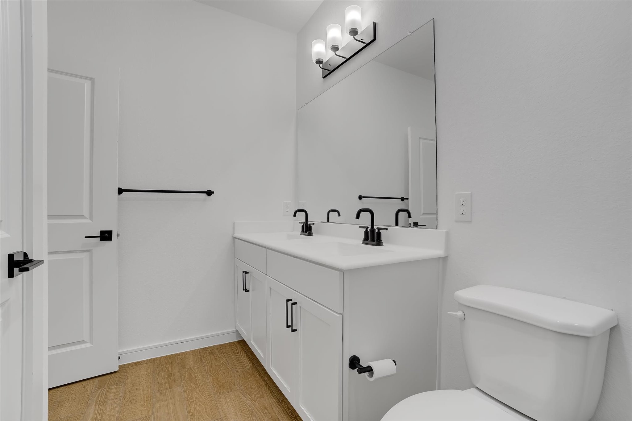 8438 Bay Rdg Circle Baytown, TX 77523 - Photo 18 of 44 a bathroom with a sink a toilet and shower