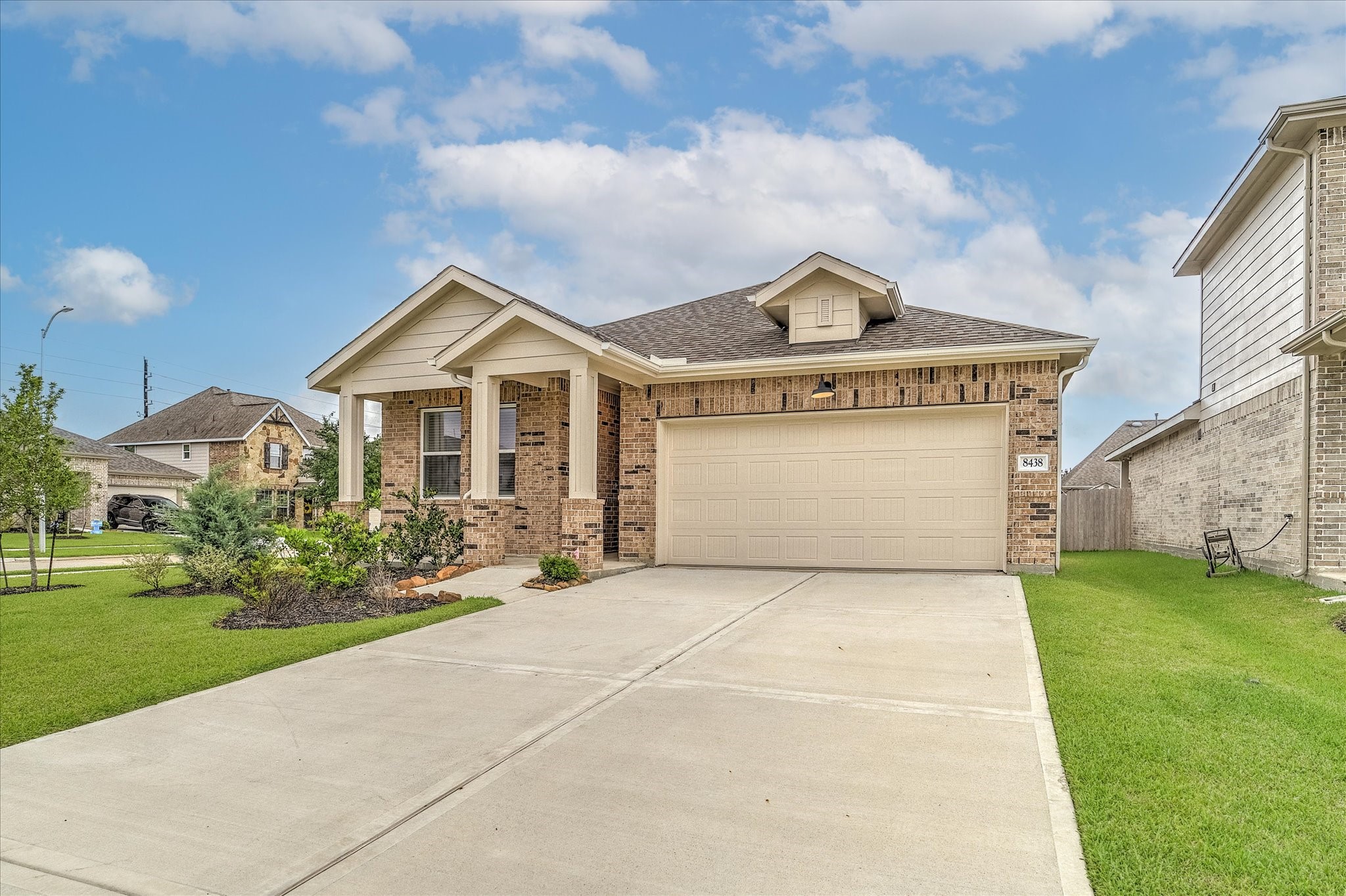 8438 Bay Rdg Circle Baytown, TX 77523 - Photo 2 of 44 a view of a house with a yard and potted plants