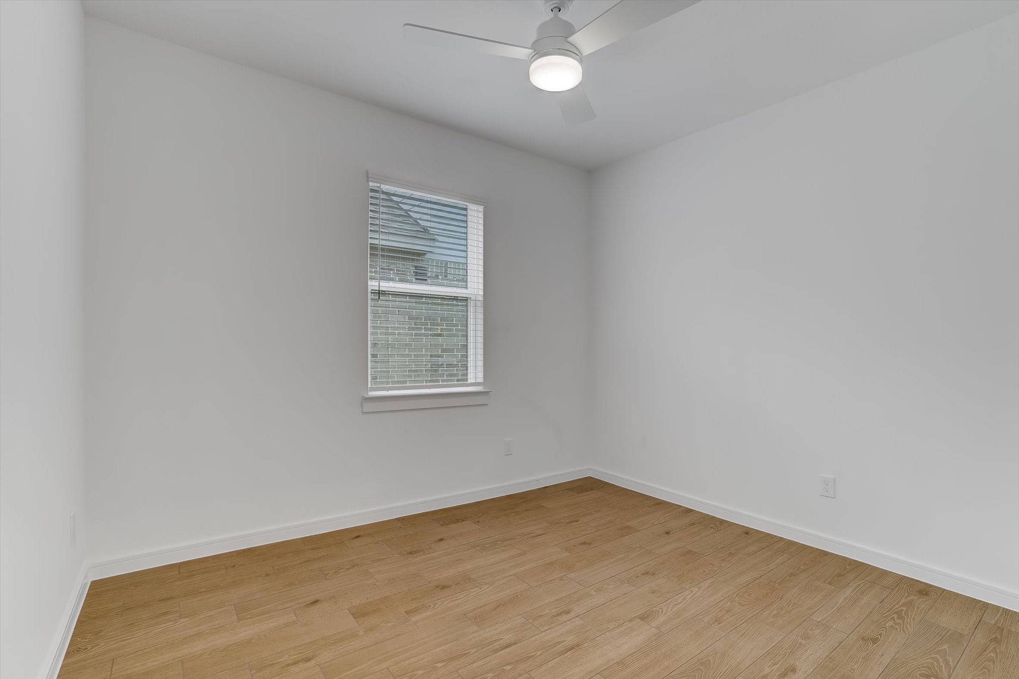 8438 Bay Rdg Circle Baytown, TX 77523 - Photo 33 of 44 an empty room with a window