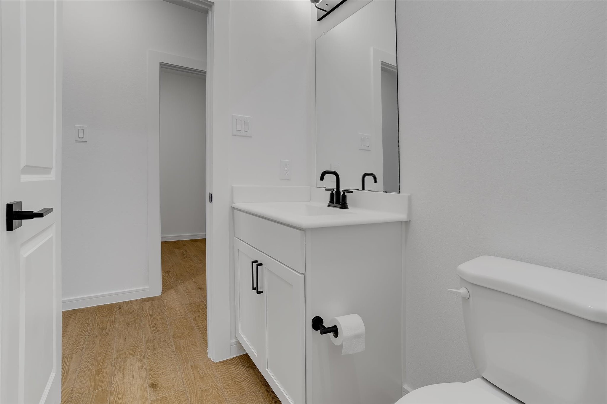 8438 Bay Rdg Circle Baytown, TX 77523 - Photo 40 of 44 a bathroom with a sink toilet and vanity