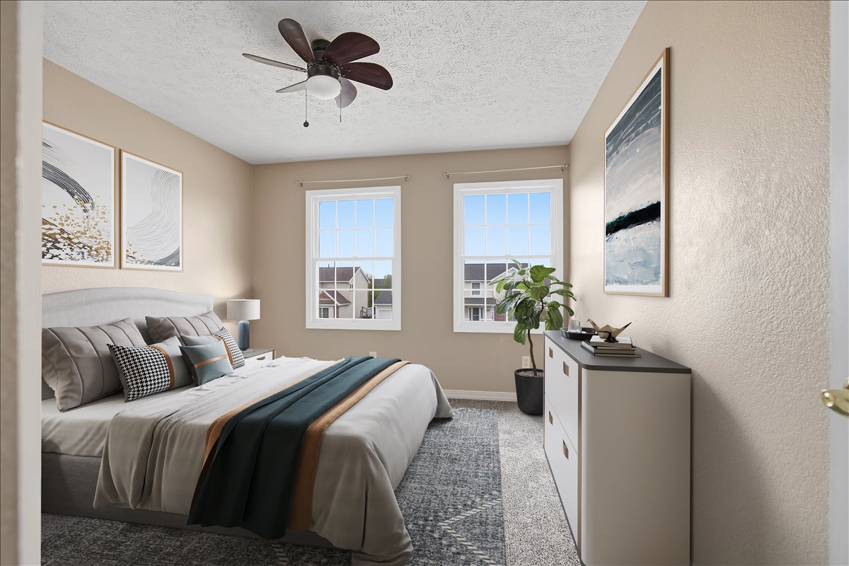 3255 Fire Fly Court Normal, IL 61761 - Photo 16 of 25 a bedroom with a balcony a bed and a chandelier