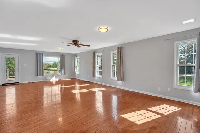 a view of entryway with wooden floor