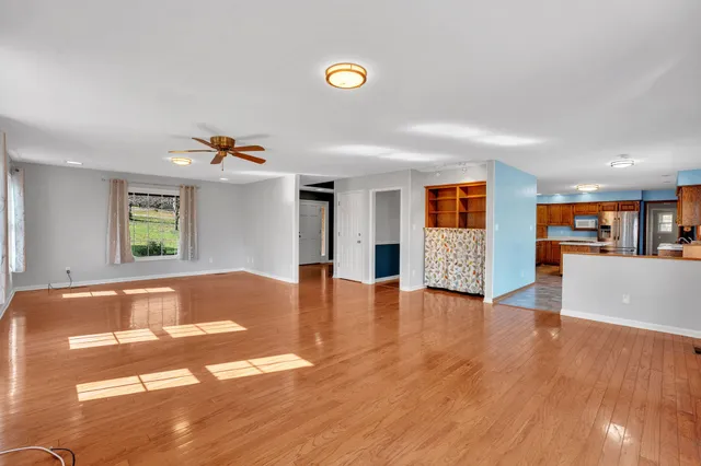 a view of a balcony with wooden floor