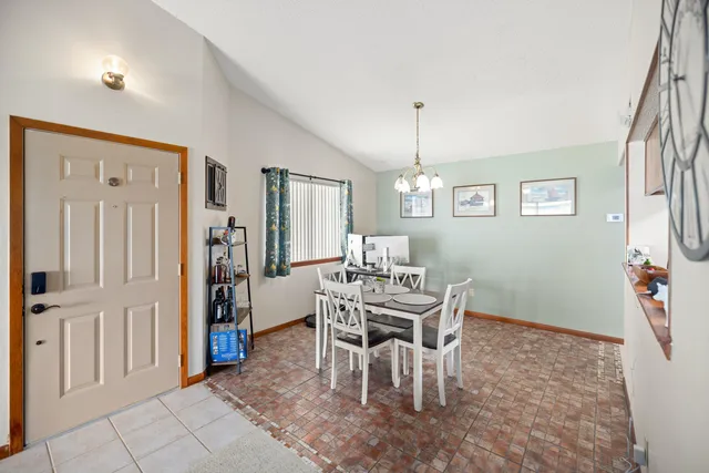 a view of a dining room with furniture