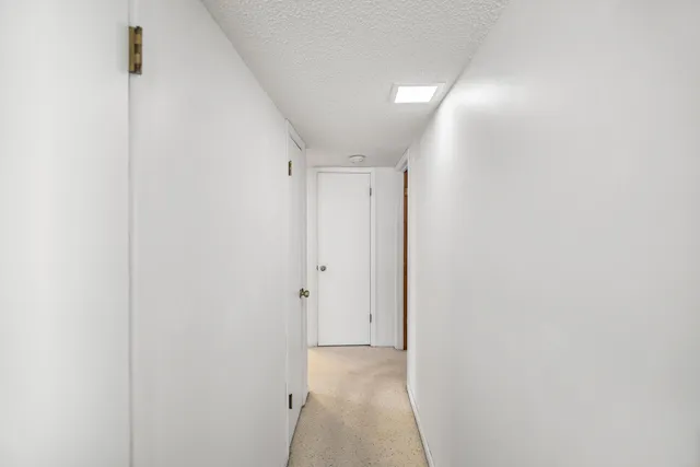 a view of hallway with an empty space