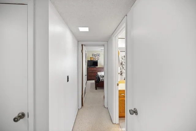 a view of an entryway and livingroom