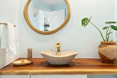 a view of a sitting area in a bathroom
