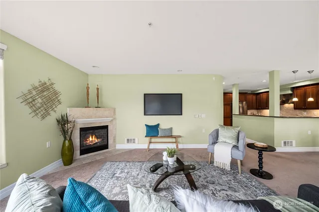 a living room with furniture and a table