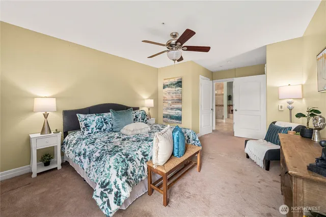 a view of a patio with couches and potted plants